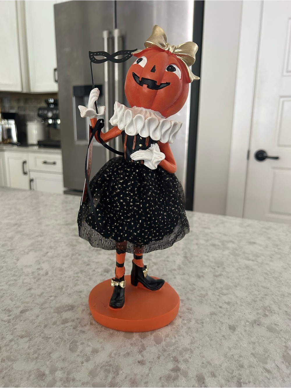 “New” Ghoulish Festive Pumpkin Lady Figurine in Orange & Black with Gold Bow